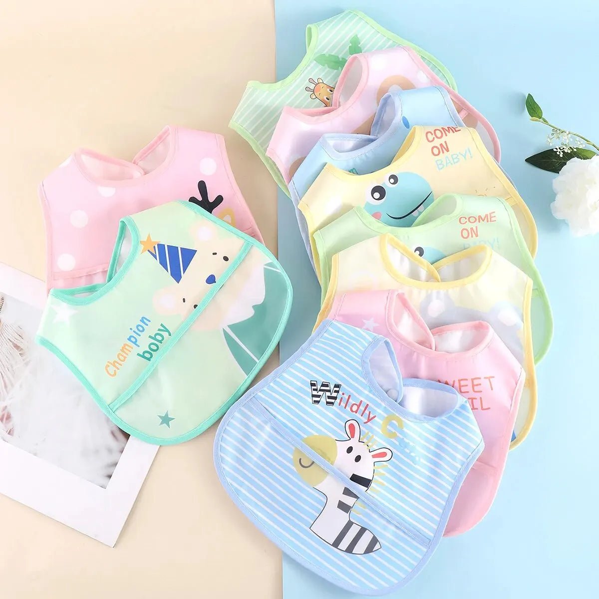 Baberos impermeables de animales (pack de 5) - MINI MUNDO