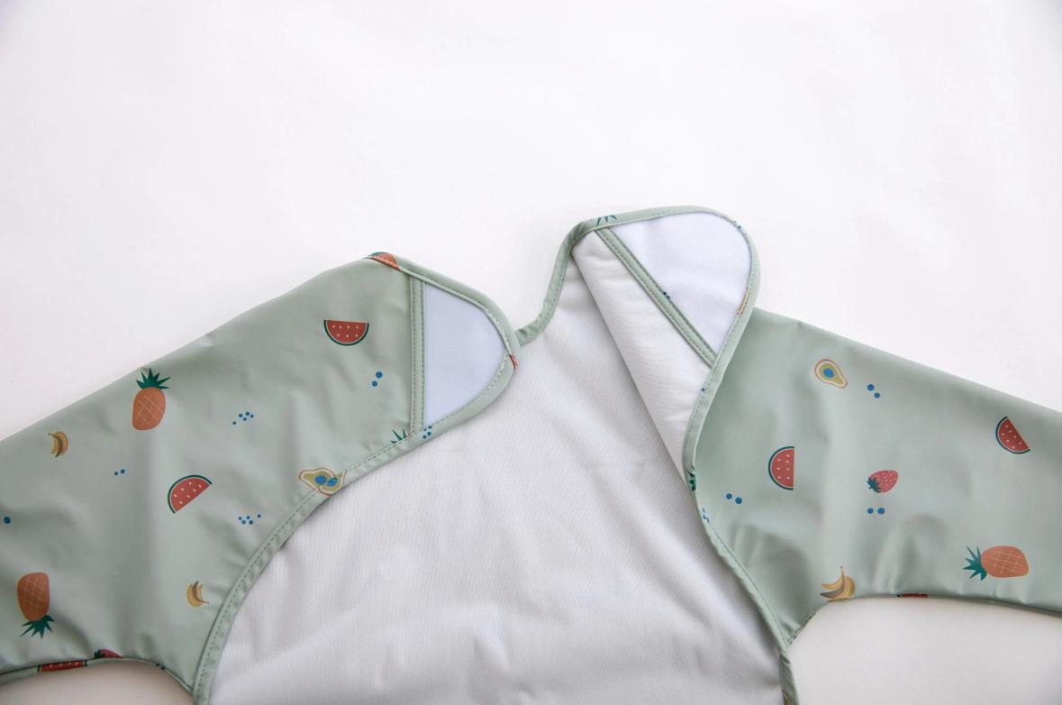 Baberos impermeables manga larga con bolsillo - MINI MUNDO