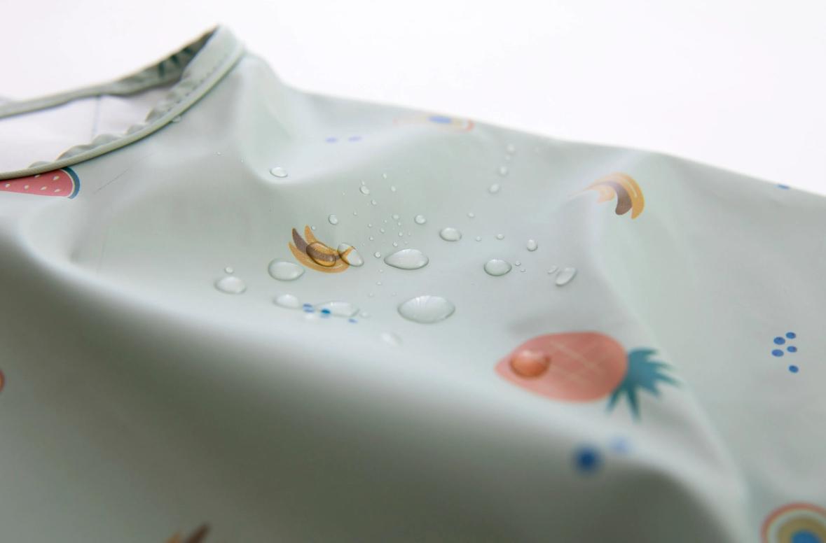Baberos impermeables manga larga con bolsillo - MINI MUNDO